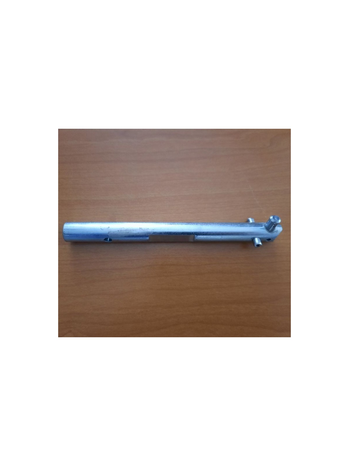 Axe de roue distributrice